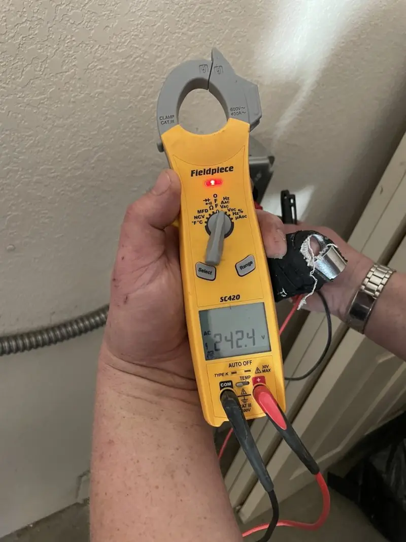 Voltage testing with clamp meter during Circuit Breaker Repair in Green Brook